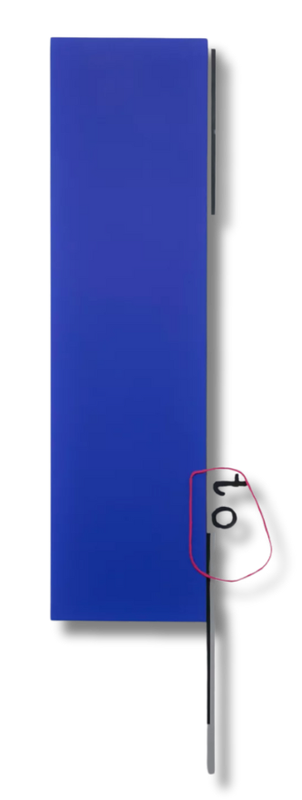 Minimalist blue rectangular panel with a delicate line detail, emphasizing vertical balance and spatial contrast.