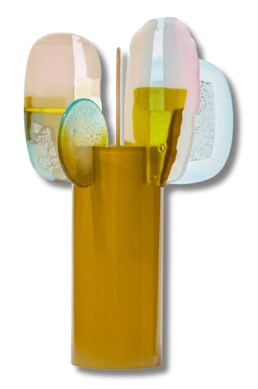 a yellow vase with glass figures popping out